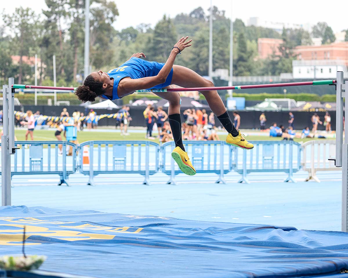 women's high jumper jumping over the bar